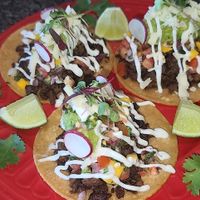 Smoked Vegan Asada Tacos with mango ghost salsa, truffle guac at Crystals Soul Cafe in Los Angeles