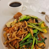 Never enough room on the plate! There's even Chinese New Year cake, yum. at Paradise Veggie 樂園素食 in Hong Kong Island