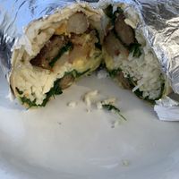 Burrito with spinach, vegan sausage, potatoes, and tons of vegan cheese  at Mama's Egg House in Idyllwild