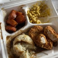 souther fried chicken with candied yams, mac & cheese, & mashed potatoes with gravy at Binge Kitchen in Austin