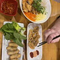 spring rolls, fried squid, rice noodle salad with vegan pork  at Saigon Xua Vegan Restaurant in Springvale