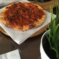 Yummy spicy pitta with tomatoes and black cumin at Pitta & More in Limassol