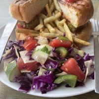 Veggie burger, fries, salad   at Punyah Cafe in Rishikesh