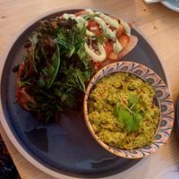 Posh beans on toast with kale and side of smashed pea, mint and edamame at Green Routes Cafe in Oxford
