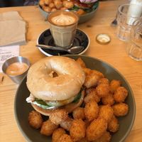 Bagel baby and latte  at Green Routes Cafe in Oxford