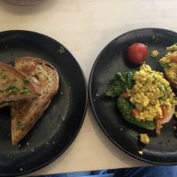 Grilled cheese sandwich with spinach, scrambled tofu on Laugenbrötchen at VHY! in Stuttgart