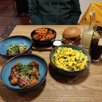 Cauliflower salad, no chicken burger, sweet potato fries, cauliflower bites, cheese bites at Tabi Loo in Leuven
