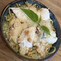 Gluten-free pasta, home made pesto, courgette, peas, «cream cheese», crushed roasted almonds, basil, «parmesan».  at Tabi Loo in Leuven