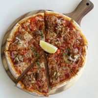 Spicy Omnituna and Omni Crab Cake Pizza  at Green Common 绿客门 in Central Singapore