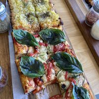 Potato/rosemary pizza & basil/zucchini/red pepper pizza   at FARO Beachside Eatery in Flagler Beach