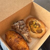 Pizza salt bread, apple crumble cake and Sausage and cheese bun 🤤 #Veganuary at Level V Bakery in Vancouver