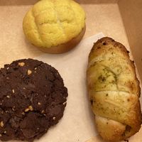 Pineapple bun (top), chocolate peanut butter cookie (bottom left), salt bun (bottom right)  at Level V Bakery in Vancouver