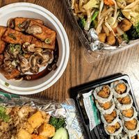 From top left: tofu mushroom steak, yakiudon, sweet potato roll, kimchi fried rice at Teton Kitchen in Buffalo