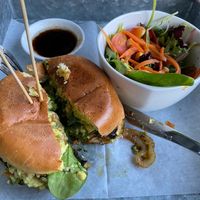 Pesto marinated Portobella burger, avocado, pepperjack , organic spinach, cilantro aioli, salad at De Leon Latin Cocina in St Augustine