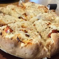 Vegan Vegan sausage and Vegan pepperoni "Mountain Pie" pizza with added calabrian chili peppers and pineapple. at Beau Jo's in Arvada