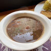 Black beans casserole with ripped plátano balls  at Veggie Beans and Shakes in Bogota