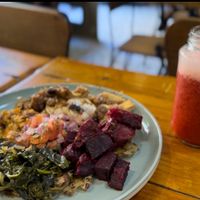 Ethiopian Wat & strawberry shake  at Veggie Beans and Shakes in Bogota