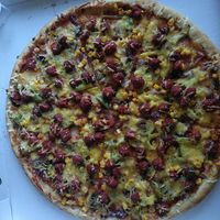 Spicy vegan chicken pizza at Savage Slice in Renfrew