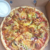 Vegan chicken Tikka pizza at Savage Slice in Renfrew