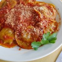 Handmade basil and tomato raviolis at Veg and Veg in Turin