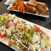 Blackened Cajun Cauliflower sandwich & Chickpea Tostadas  at LesbiVeggies in Camden