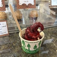 Blueberry and strawberry twist ice cream with berry sauce at Divine Treasures in Manchester
