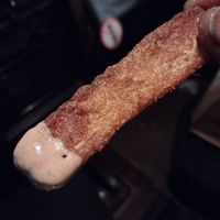 The crispiest, dense fluff,.well seasoned cassava French fry everrrr at Roasted and Raw in Oakland