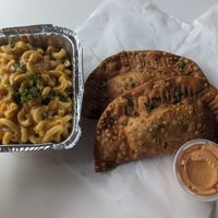Empanadas and mac & cheese at Roasted and Raw in Oakland