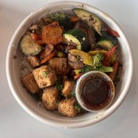 Orange teriyaki with tofu  at Roasted and Raw in Oakland