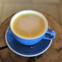 Oat milk turmeric latte  at Baked Cafe in Whitehorse