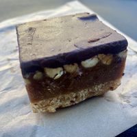 Snickers slice   at The Good Food Bakery in Mornington