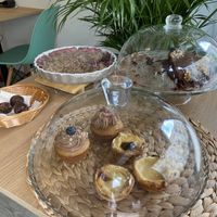Sweet items. Left to right: truffles, crumble, chocolate cake, muffins and pastel de nata at Vizzio Cafe in Lisbon