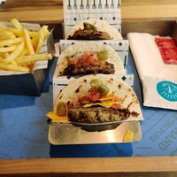 Vegan Mexican burgers in tortillas at Free The Fork in Amman