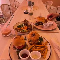 Hamburguesas gemelas y alitas de orellanas de entrada  at Pura Vida in Bogota