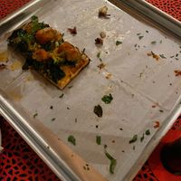 Also ate the Jackie Chan right away! Each square slice is sliced to provide 4 easy to pick up pieces. at Wildwood Pizza in Punta Gorda