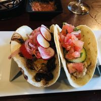Tacos: the vegan with black beans and Brussels, and the vegetarian with roasted cauliflower   at Flying Iguana in Neptune Beach
