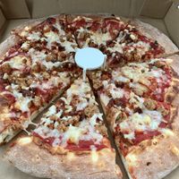 Loaded meat pizza: Daiya cheese, soy sausage, soy chicken, soy pepperoni & soy chorizo. at Vegan Korner in Grand Terrace