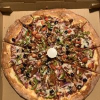 Supreme pizza  at Vegan Korner in Grand Terrace