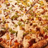 Pizza with Peppercorns pineapple  at Vegan Korner in Grand Terrace