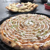 Buffalo chicken ranch pizza with cheesy bread at Vegan Korner in Grand Terrace