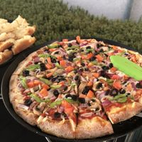 Veggie pizza￼ at Vegan Korner in Grand Terrace
