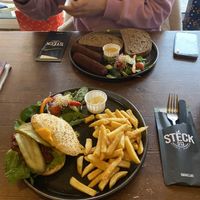 Vegan Sloppy Joe burger with lentils in spicy tomato sauce with vegan cheddar & bread with vegan mushroom croquettes.   at Steck in Tilburg