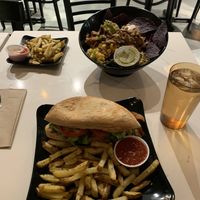 Smoked tempeh sandwich with baked fries; Aztec bowl with brown rice and baked fries . at Copper Branch in Nashville