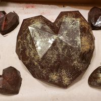 Breakable chocolate heart with strawberries and truffles for Valentines Day at GG's Vegan Bakery in Bozrah