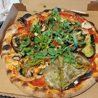 Vegetarian pizza + rucola (He offered us to add rucola instead of cheese). The pizza was good at La Sicilienne des Pizzas in Lyon
