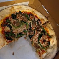 I couldn't wait to eat so the picture is missing a slice. at D'Matteos Pizza & Grill in Ronkonkoma