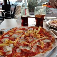 Vegan pizza with bacon at Chris Kitchen in Fuerteventura