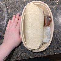 Huge Nashville hot chick’n burrito  at Under the Ground Blono in Downs