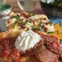 Pickle pizza and pepperoni vegan with ricotta   at Maipai in Hamilton