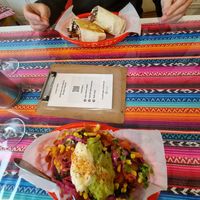 Loaded fries with frijoles (front) at Cocina Comida in Adelaide
